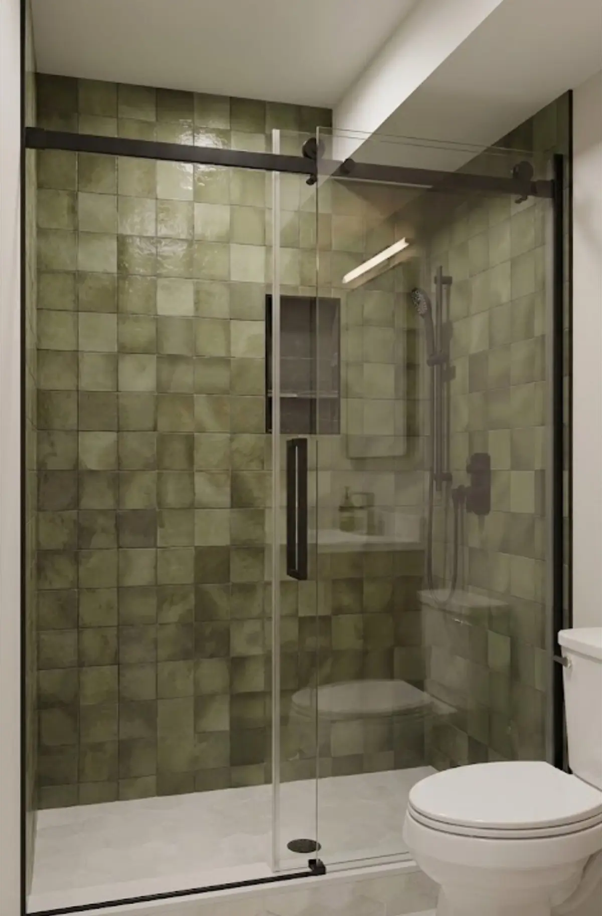Walk-in shower with glossy green square wall tile, a recessed niche and a sliding glass door